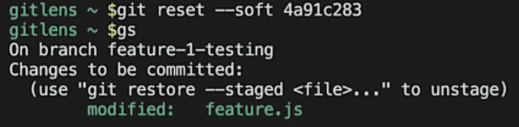 Running git reset –soft 4a91c283 in the terminal and then running a Git Status to show the file feature.js as modified and staged. Using GitLens.
